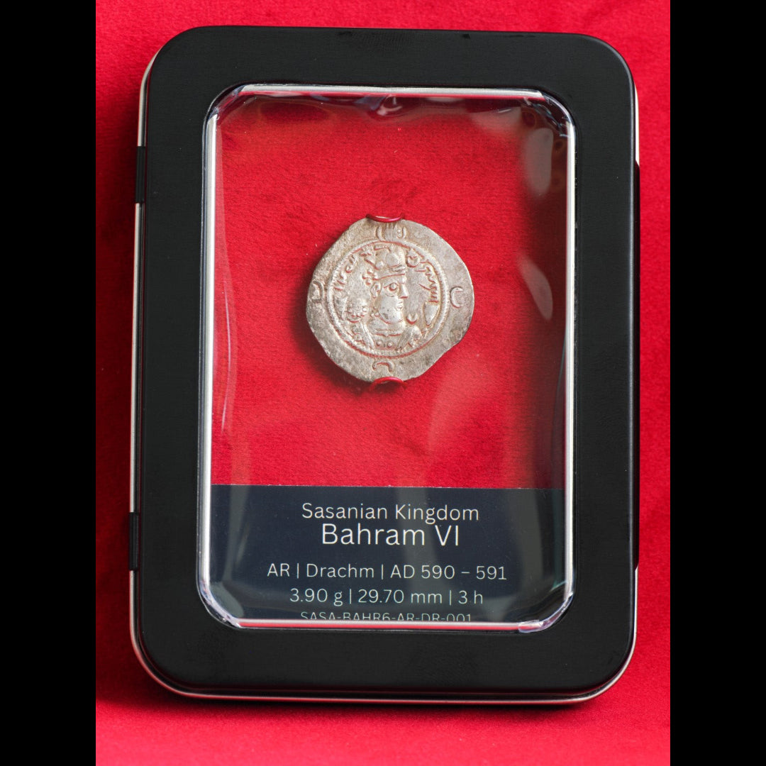 A Sasanian Kingdom Bahram VI silver drachm coin from AD 590-591, displayed inside a black protective case with a red velvet backing and a black label.