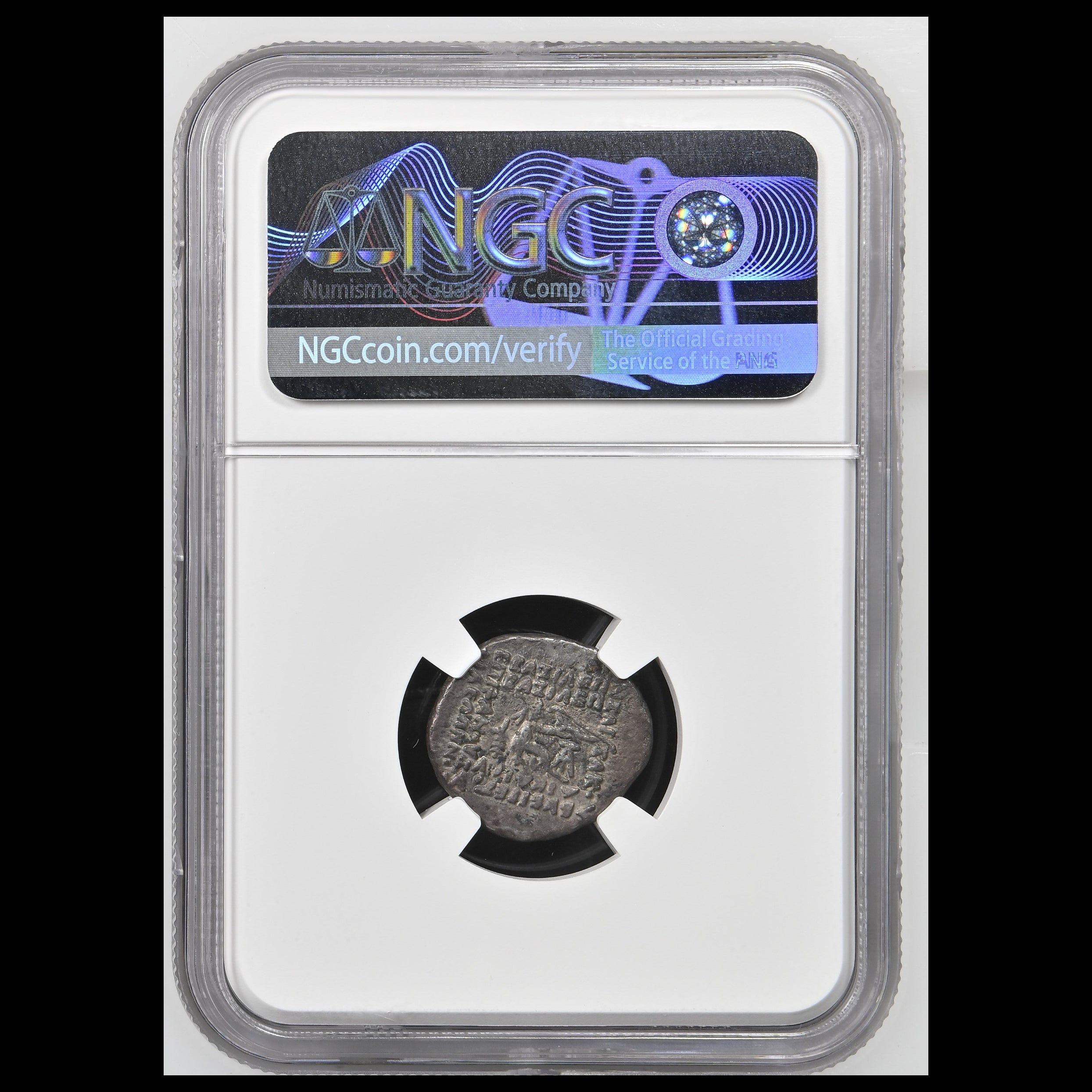 An ancient silver coin encapsulated in a clear NGC grading holder, featuring a black circular insert and a holographic NGC label at the top.